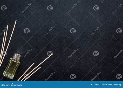 Air Freshener Sticks On Dark Background Top View Mockup Stock Photo