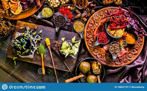 Top View Spices And Herbs Ingredient Decoration On Wood Table For Cook