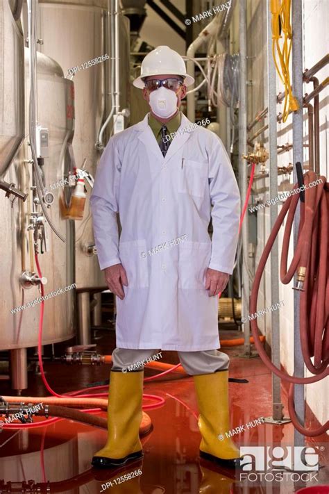 Engineer Standing In A Chemical Plant Stock Photo Picture And Royalty