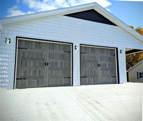 Stamped Carriage House Garage Doors In Driftwood Accents Woodtones