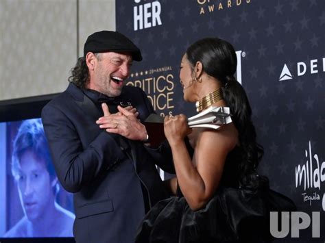 Photo Troy Kotsur And Angela Bassett Win Best Supporting Actress Award