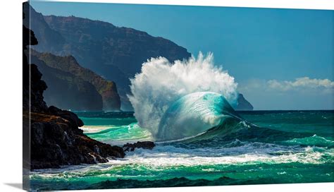 Large Ocean Wave Crashes Into Rock Along The Na Pali Coast Kauai