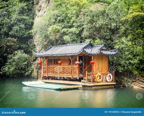 Baofeng Lake Boat Trip In A Rainy Day With Clouds And Mist At