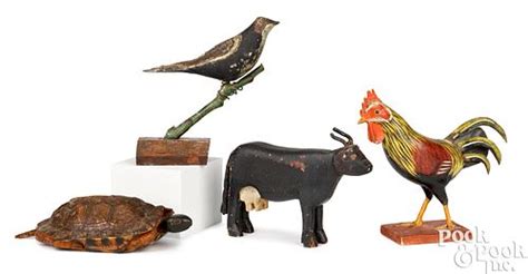 Four folk art carved animals for sale at auction on 18th January ...