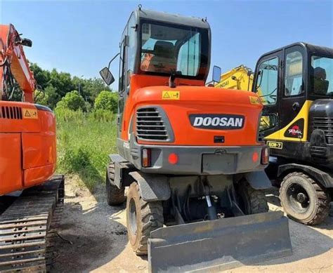 Low Fuel Consumption Usato Escavadora Wheel Type Doosan Dx