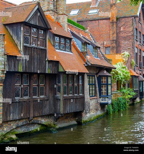 Medieval houses by canal in Bruges, Belgium Stock Photo - Alamy