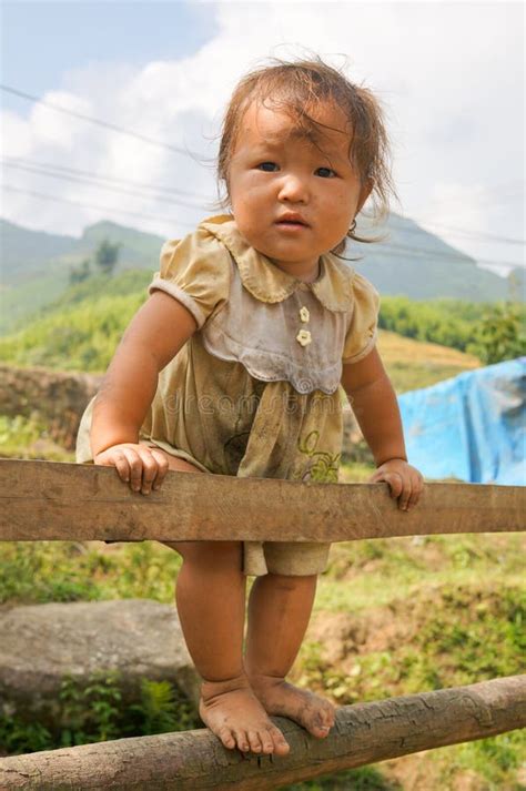 Vietnam Girl In Traditional Costume Rowing Boat For Travel Editorial