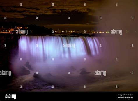 The illuminated Horseshoe canadian Niagara falls at night. Canada Stock ...