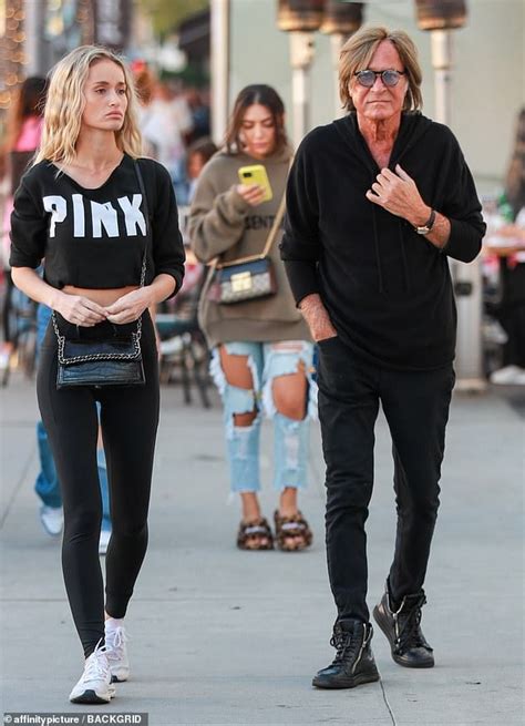 Gigi Hadid S Dad Mohamed Steps Out For A Stroll With Leggy Model