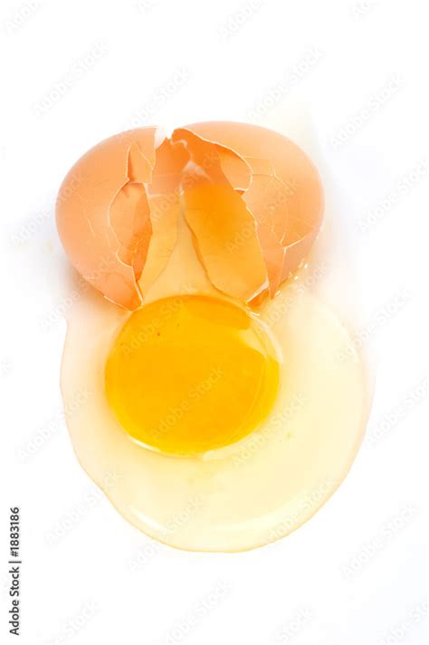 cracked egg Stock Photo | Adobe Stock