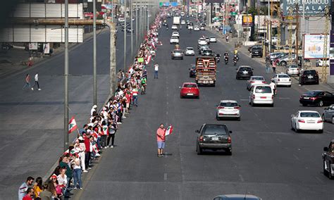 Lebanon Protesters Form 170 Kilometre Long Nationwide Human Chain