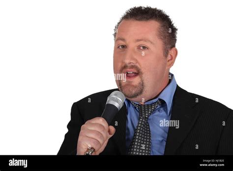 Business man singing karaoke Stock Photo - Alamy