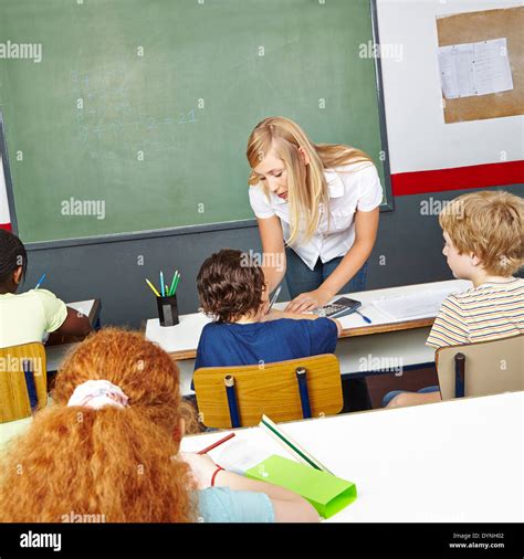 Teacher Helping Student With Math