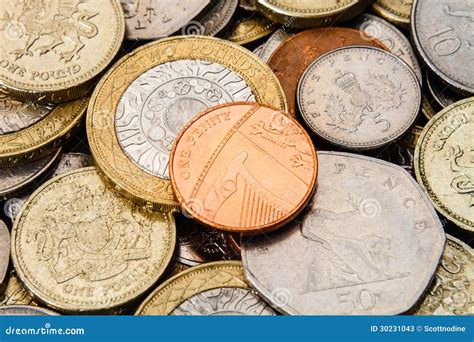 A Single British Penny On Top Of A Pile Of Coins Stock Image Image Of