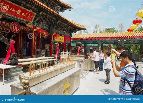 People Visit Sik Sik Yuen Wong Tai Sin Temple At Kowloon In Hong Kong