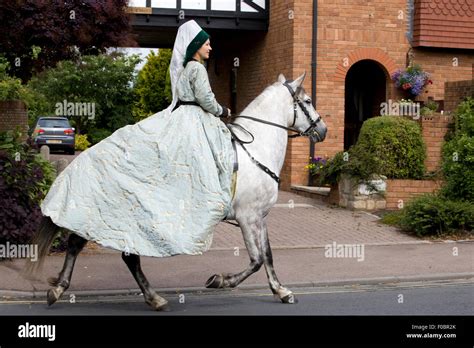 Horse and rider in medieval costume riding though Tewkesbury Stock ...