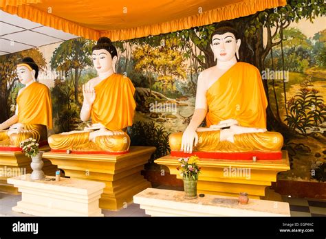 Three Sitting Buddha Statues At Huge Reclining Buddha Shwethalyaung