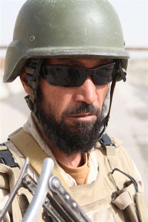 An Afghan National Army Soldier Stands Guard Outside Nara And Dvids