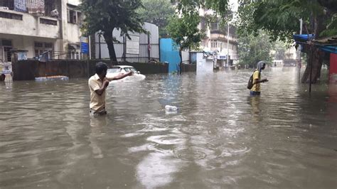 Heavy Rain Water Logging Disrupts Mumbais Public Transport Mumbai