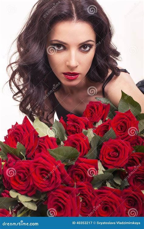 Beautiful Woman With Dark Hair Posing With A Big Bouquet Of Roses Stock Image Image Of