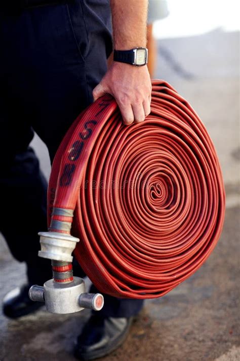 Carrying Fire Hose Stock Photos Free And Royalty Free Stock Photos From