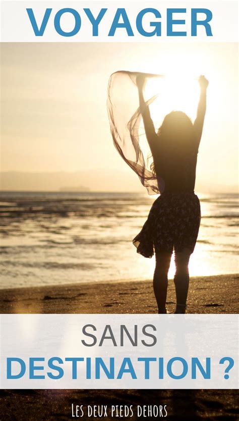 A Woman Standing On Top Of A Beach Next To The Ocean With Her Arms In