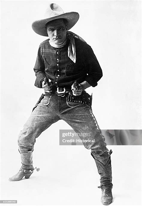 Cowboy Star Tom Mix Poses With His Pistols Mix And His Horse Tony