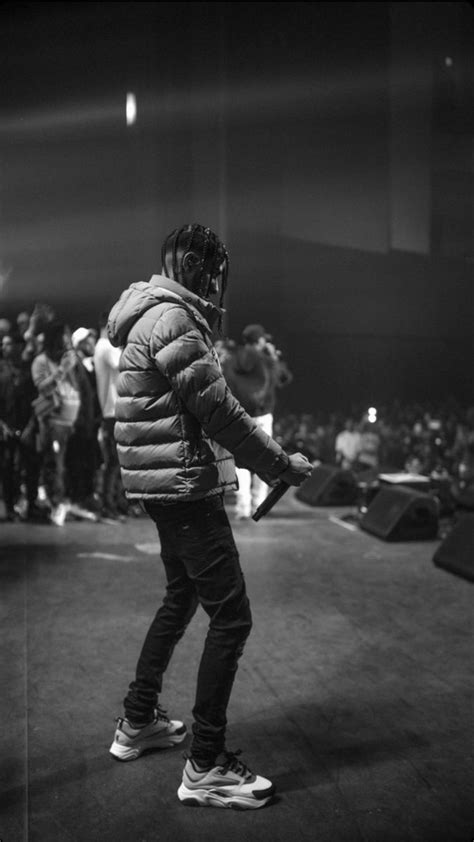 Black And White Photograph Of Skateboarder In Front Of Crowd At Indoor