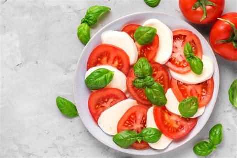 Caprese Salad With Ripe Tomatoes And Mozzarella Cheese Fresh Basil