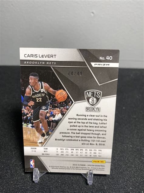 2018 19 Panini Spectra Caris Levert Green Prizm Refractor SP 49 Nets