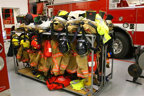 Firemen's Equipment Rack Photograph by Russell Bowman - Fine Art America