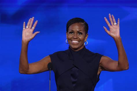 Michelle Obama Means Business In Navy Power Suit As She Calls On