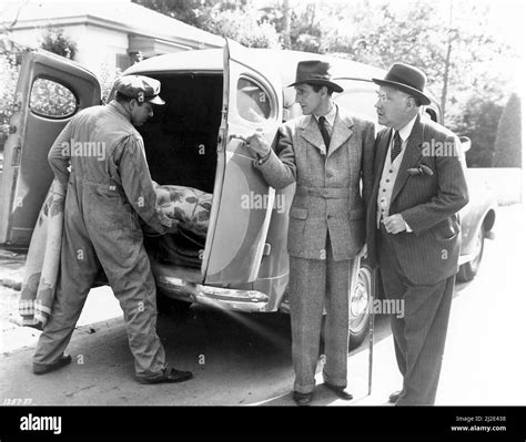 BASIL RATHBONE And NIGEL BRUCE In SHERLOCK HOLMES IN WASHINGTON 1943