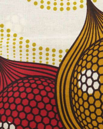 Tissu africain motif graphique étoile jaune rouge fond blanc Mercerine