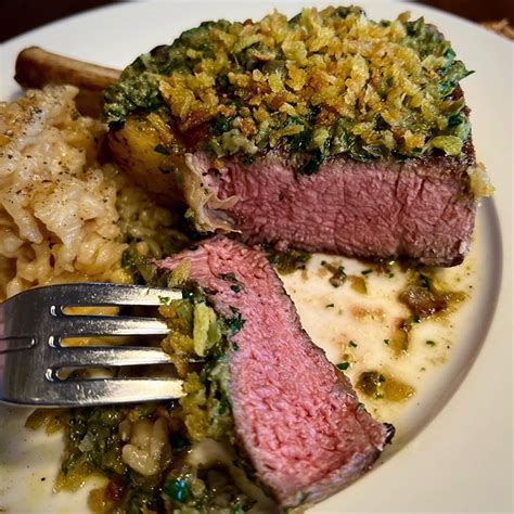 Rose Veal Op Rib Chop With Nasturtium Flower Risotto And Radicchio