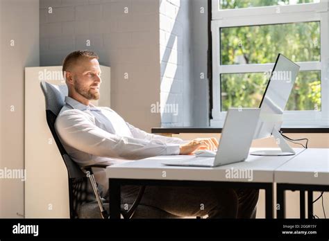 Sitting In Wrong Bad Posture At Office Desk Stock Photo Alamy