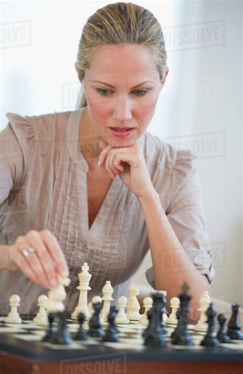 Woman Playing Chess Stock Photo Dissolve