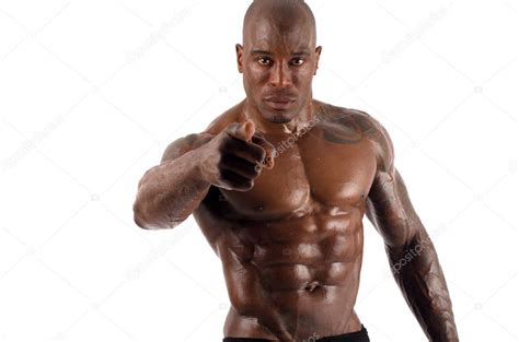 Black bodybuilder pointing to you and asking you to train harder. Strong man with perfect ...