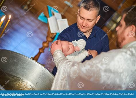 Baptism Of A Newborn In Holy Water Bathing Youth On The Water Baptism