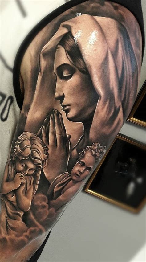 50 tatuagens religiosas para você se inspirar Tatuagem braço