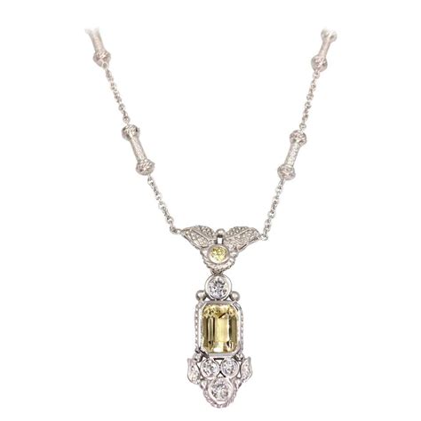 Judith Ripka 18 Karat White Gold Diamond Sapphire And Yellow Beryl