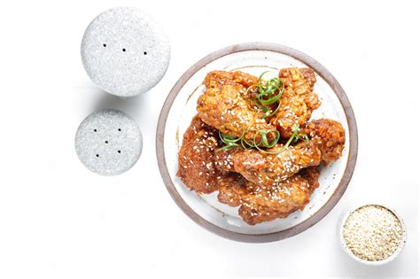 Premium Photo Korean Fried Chicken Yangnyeom Tongdak With Spicy Sauce And Sesame Seed Sayap