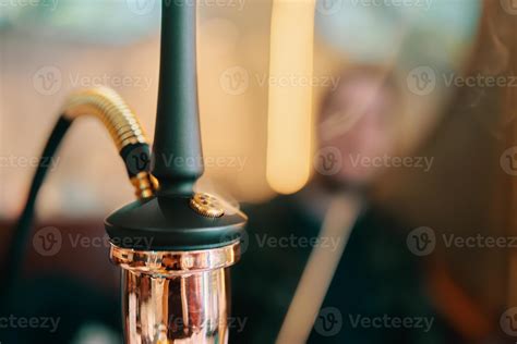 Hookah on table in lounge bar. 14260516 Stock Photo at Vecteezy