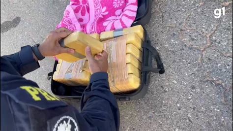 V Deo Passageira Presa Pela Prf Transportando Coca Na Em Mala Em