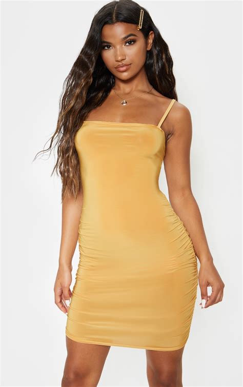 Mustard Ruched Tie Back Strappy Bodycon Dress Prettylittlething