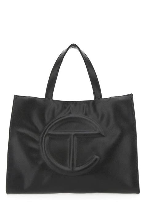 Telfar Logo Embossed Medium Tote Bag in Black | Lyst