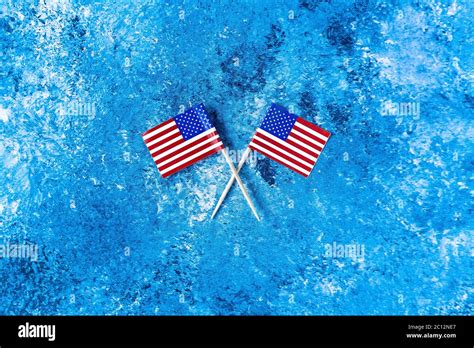 American Flags Flags Of Usa Two American Flags Lie Crosswise On A