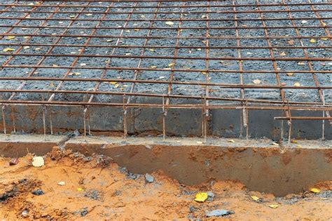 Premium Photo Installation Of Reinforcement And Formwork For Reinforced Concrete By Builders