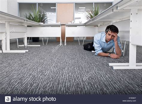 Person Hiding Under Desk High Resolution Stock Photography And Images