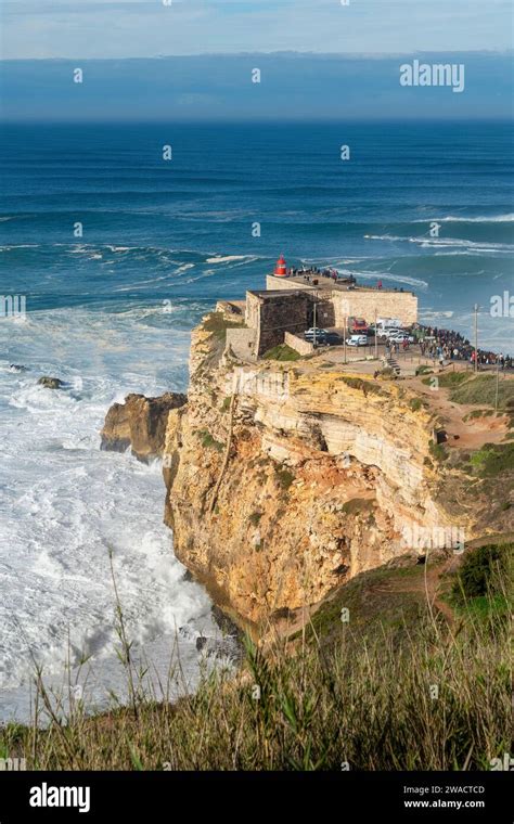 Fort Of Sao Miguel Arcanjo Lighthouse In Nazare Portugal Stock Photo